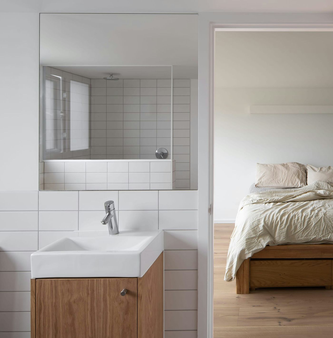 Ensuite bathroom and master bedroom suite within From Works loft conversion and rear dormer extension in Blackheath, London.