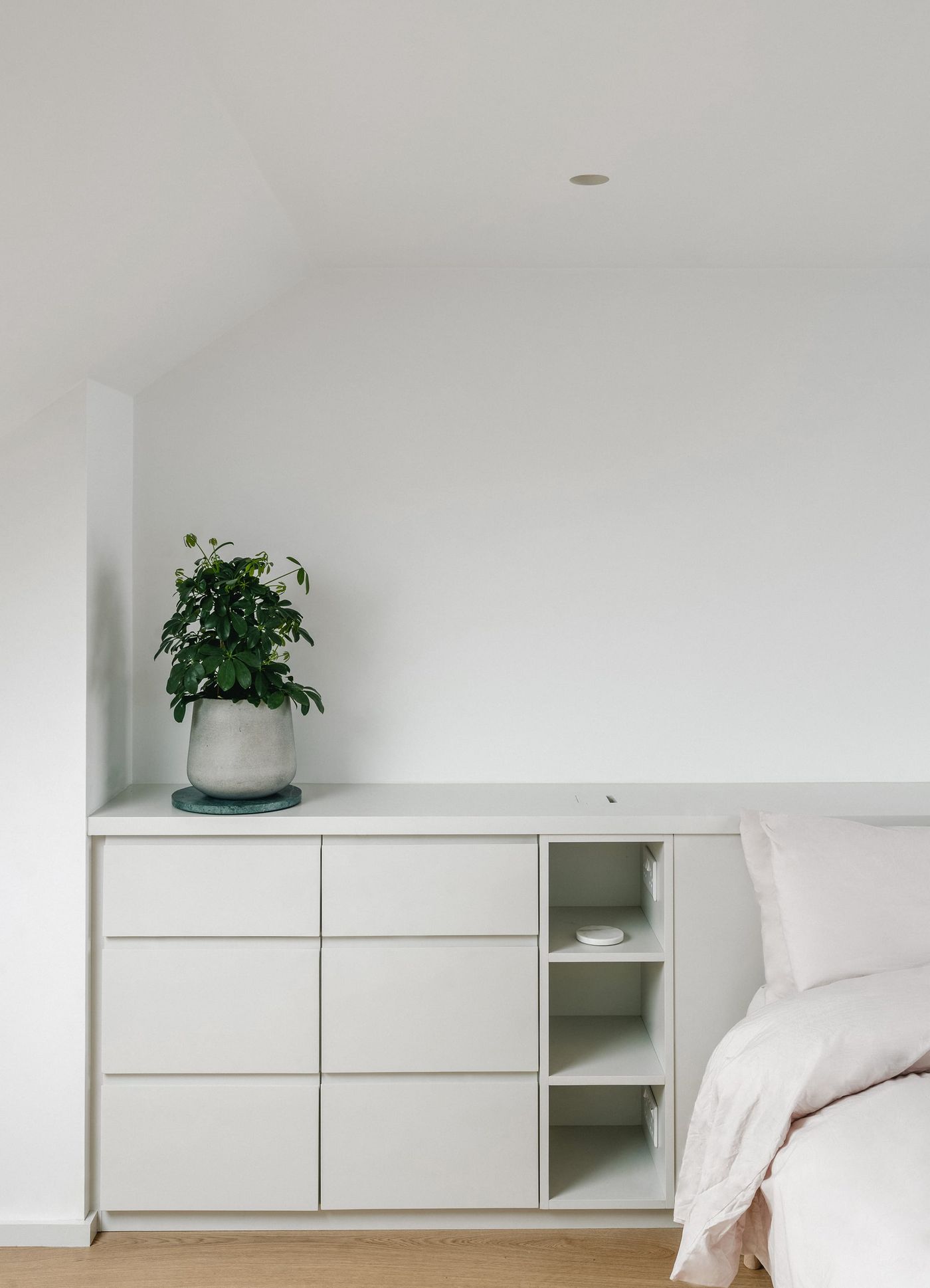 Internal view looking into light, calm rear dormer extension in South London designed by From Works.