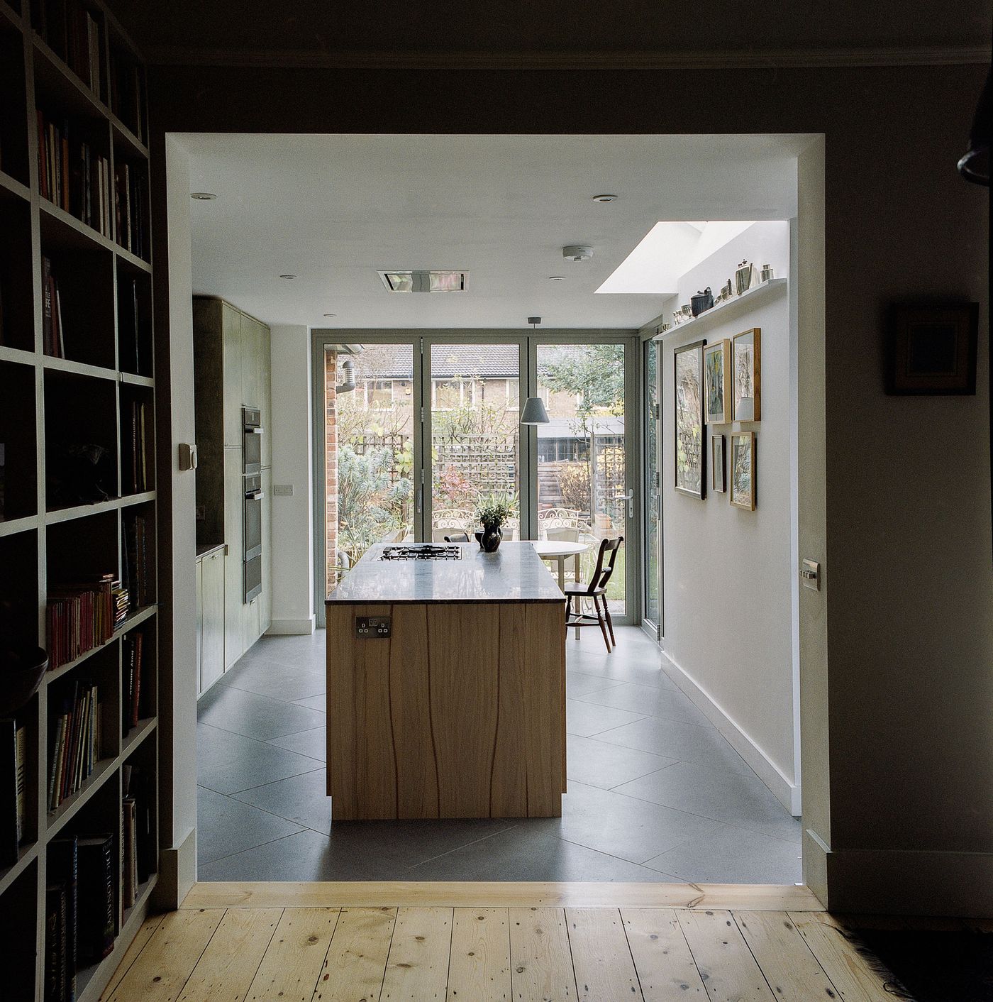 Moss green stained plywood and steamed beech kitchen by From Works and Ma-kon.